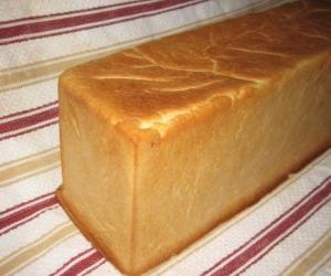пазл Буханка хлеба в хлебопекарной, чтобы разрезать на ломтики, как нарезанный хлеб